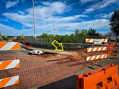 The bridge is under construction, but the mark is still accessible.